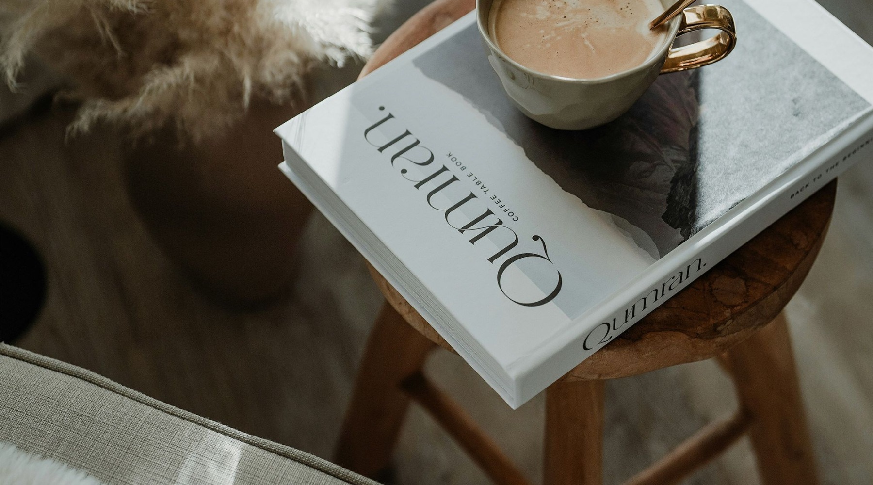 a cup of coffee on a book