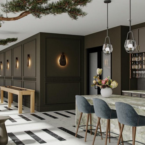 a kitchen with a bar and chairs