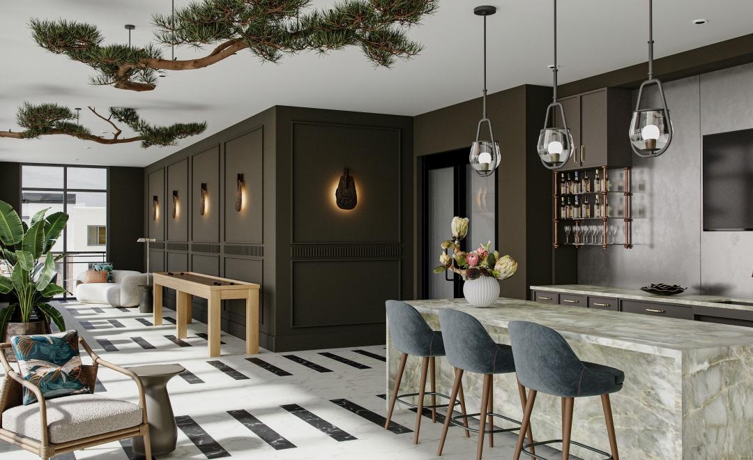 a kitchen with a bar and chairs